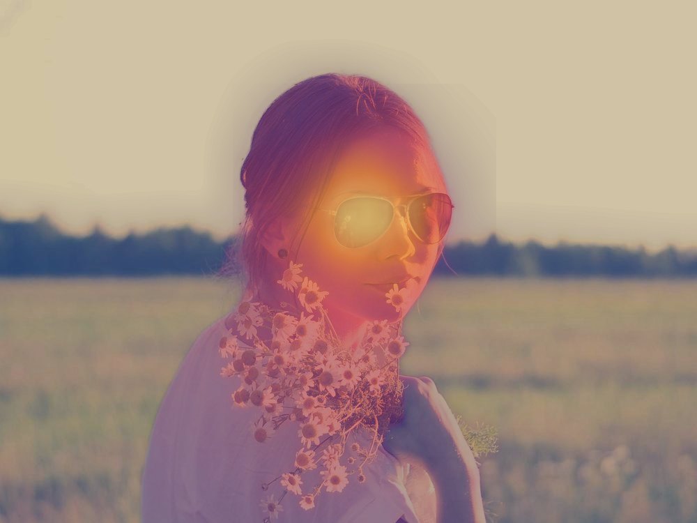 A sample result: an attention heatmap over a portrait, with the face lit up as the first place people look.